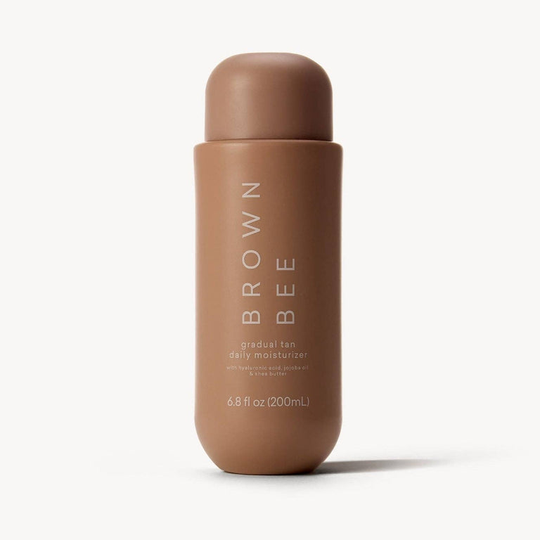 Brown Bee Gradual Tan Daily Moisturizer in a matte brown 6.8 oz bottle against a plain background